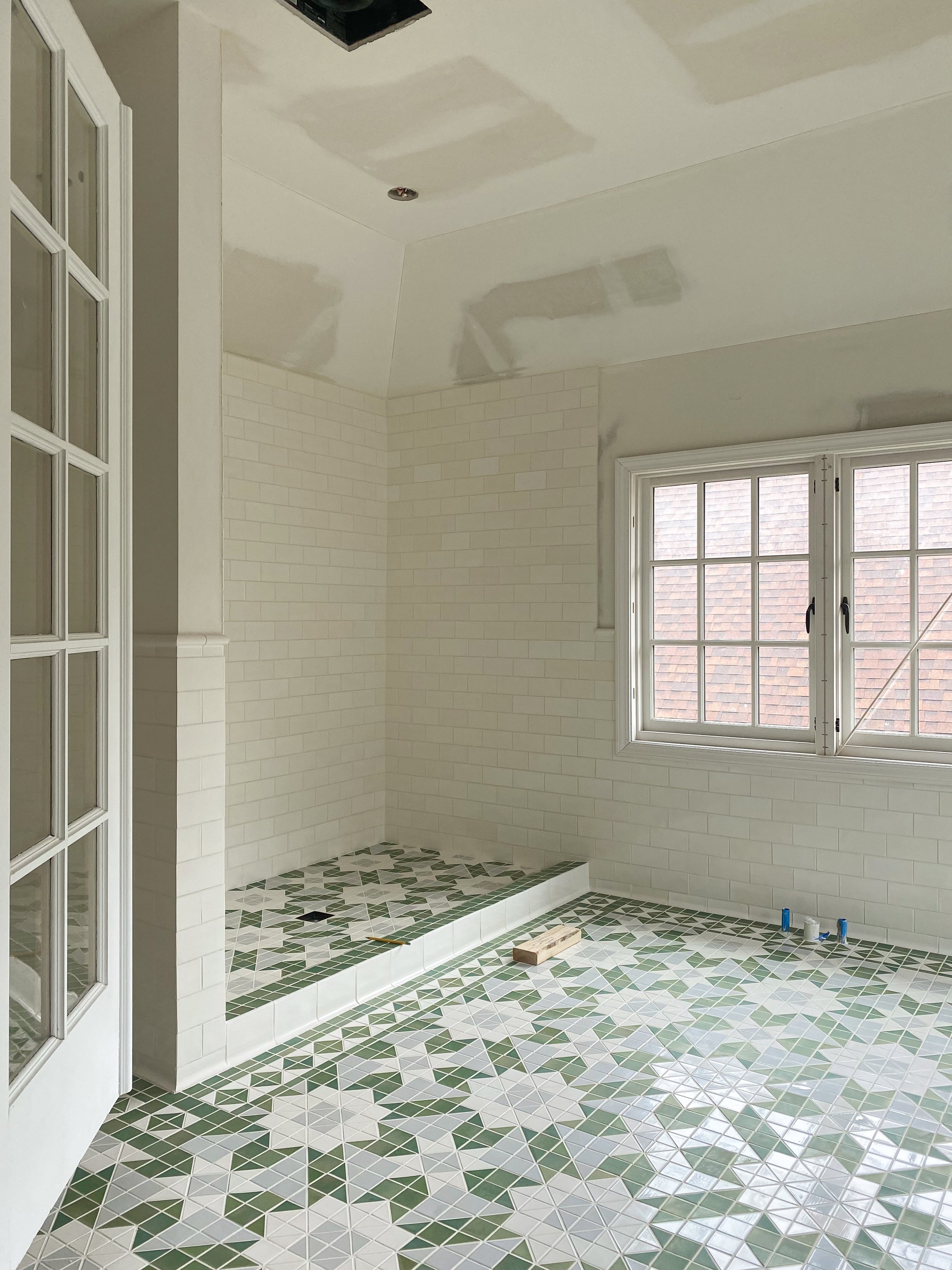 green tile pattern in bathroom