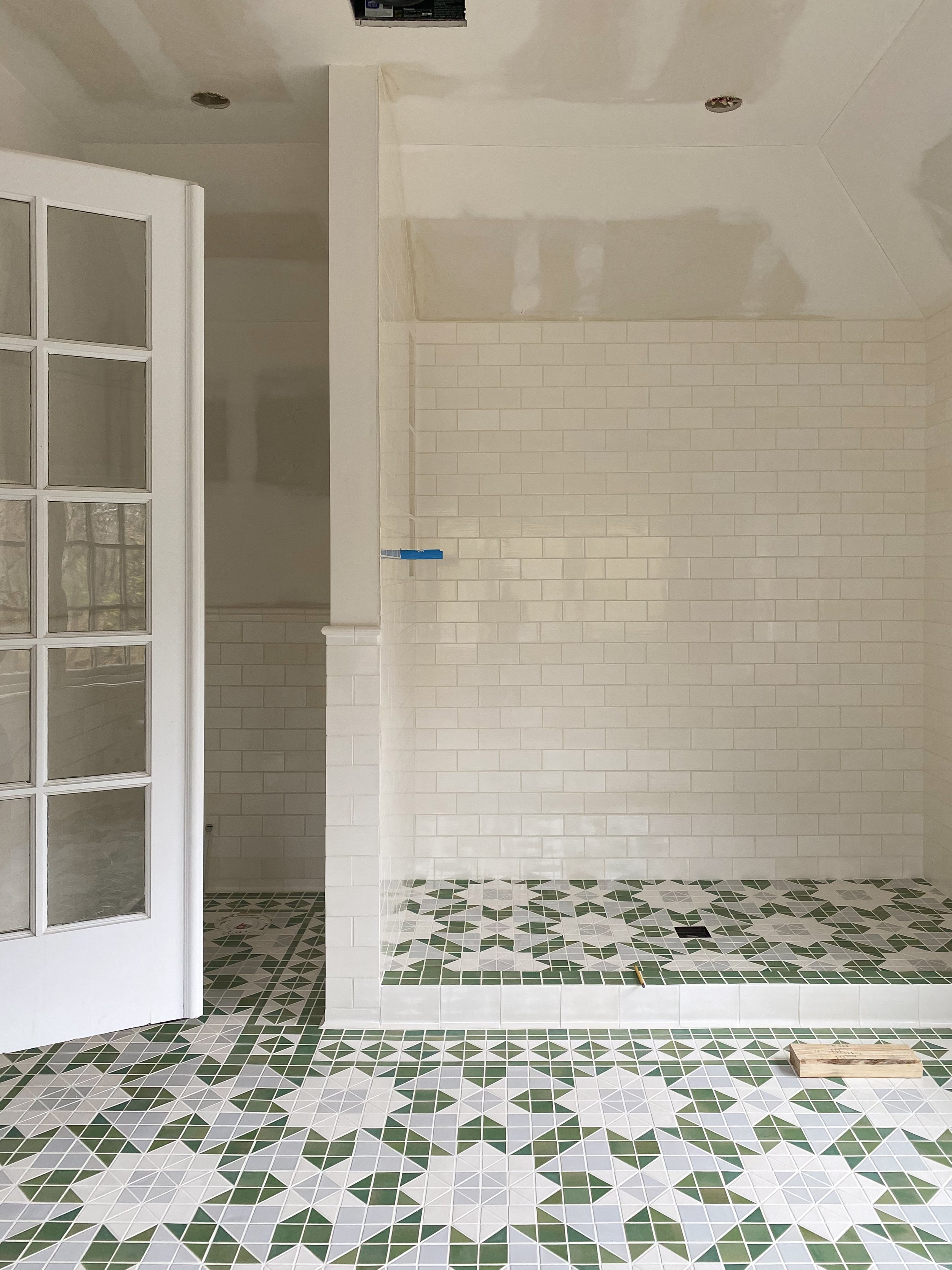 green tile pattern in bathroom