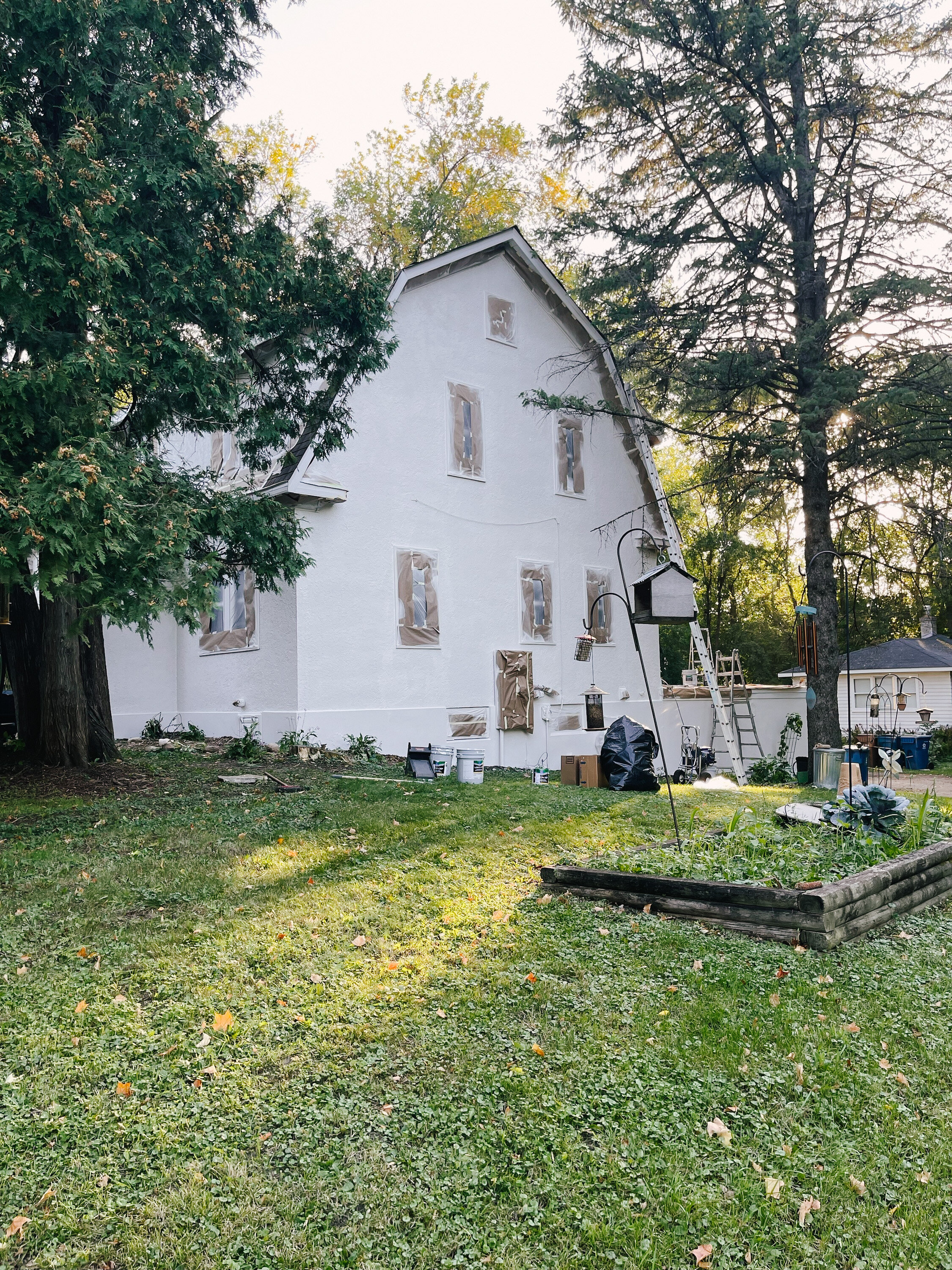 patticakewagner stucco farmhouse exterior painting.JPG